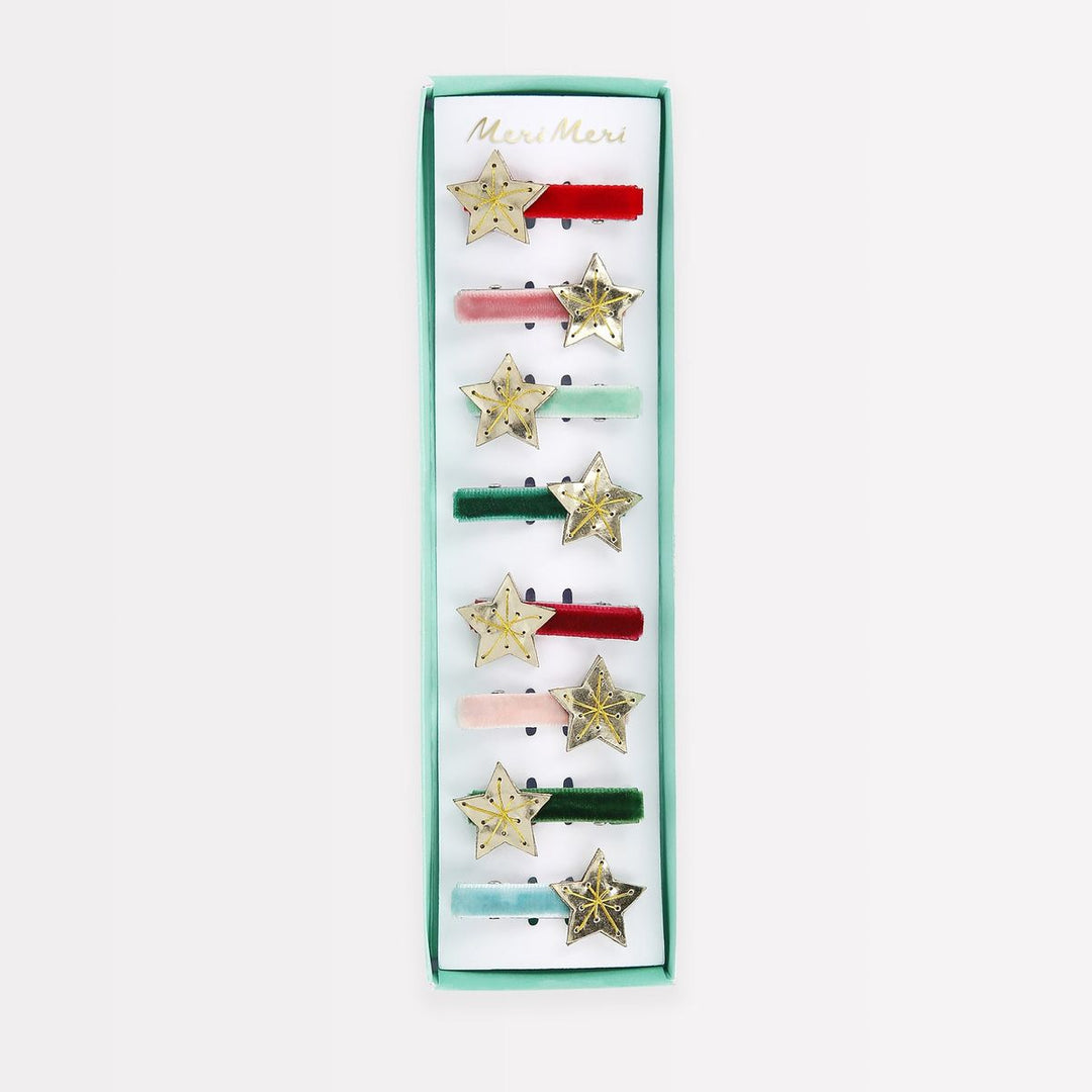 Set of star-shaped hair clips in a green box with 'Mimi & Mela' branding on a white background.