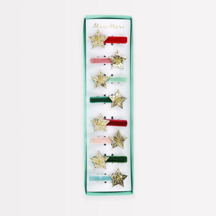 Set of star-shaped hair clips in a green box with 'Mimi & Mela' branding on a white background.