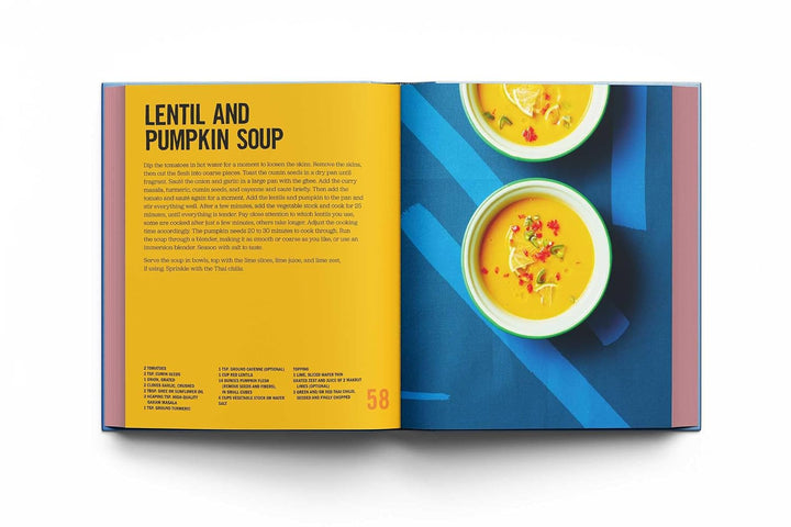 An open cookbook spread showing a recipe for Lentil and Pumpkin Soup. The left page has a bright yellow background with black title text and recipe details, while the right page features a blue background with two bowls of orange soup and small food garnish photos.