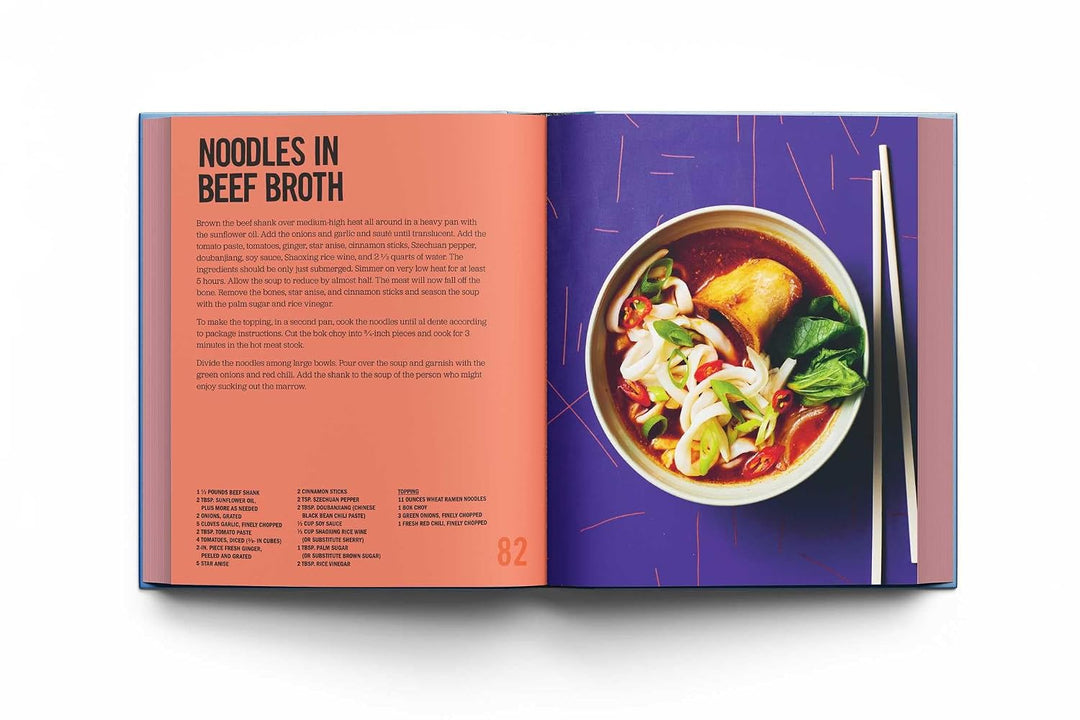 An open cookbook spread showing a recipe page titled 'Noodles in Beef Broth' on the left and a prepared noodle bowl photo on the right, photographed against a clean white background.