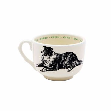 Ceramic mug with a dog illustration and text on a white background