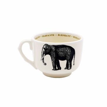 White mug with black elephant design on a white background