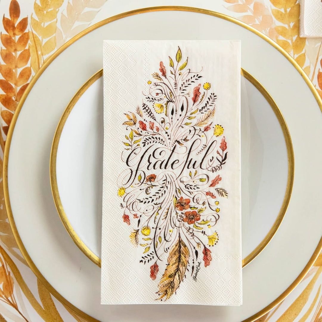 Decorative card with 'Grateful' text on a plate with gold rim