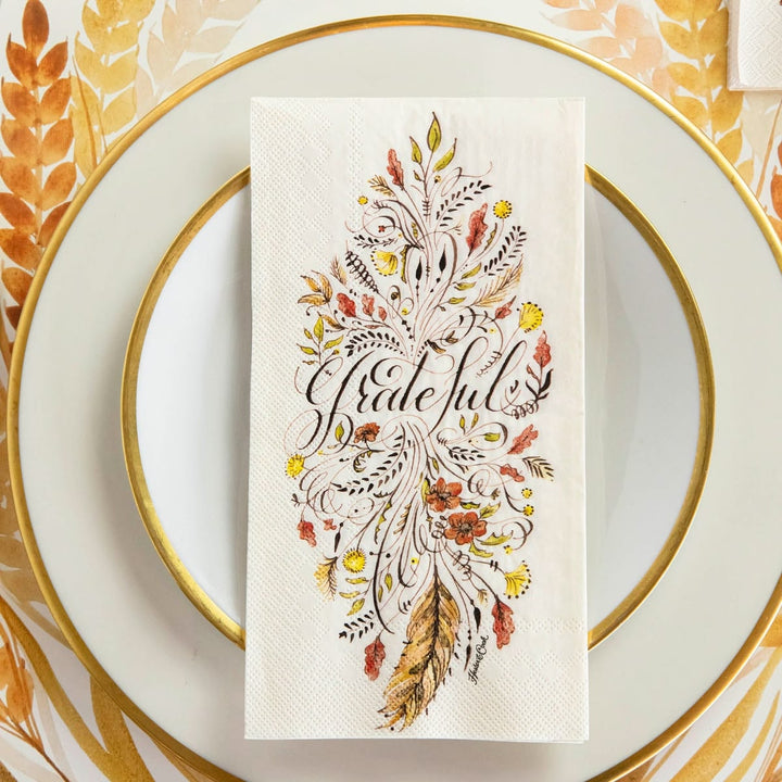 Decorative card with 'Grateful' text on a plate with gold rim