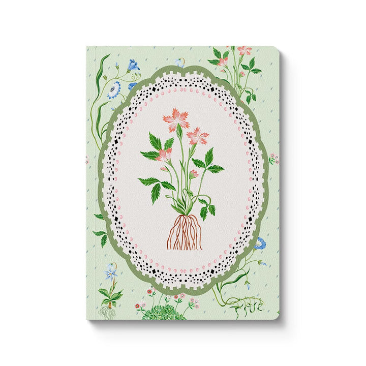 Notebook cover with floral design on a light green background