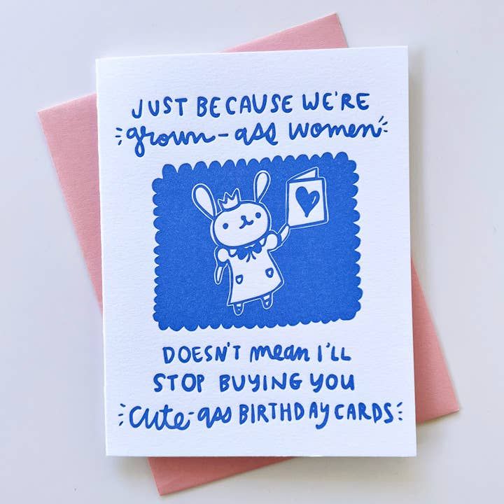 Greeting card with blue text and cartoon character on a white background