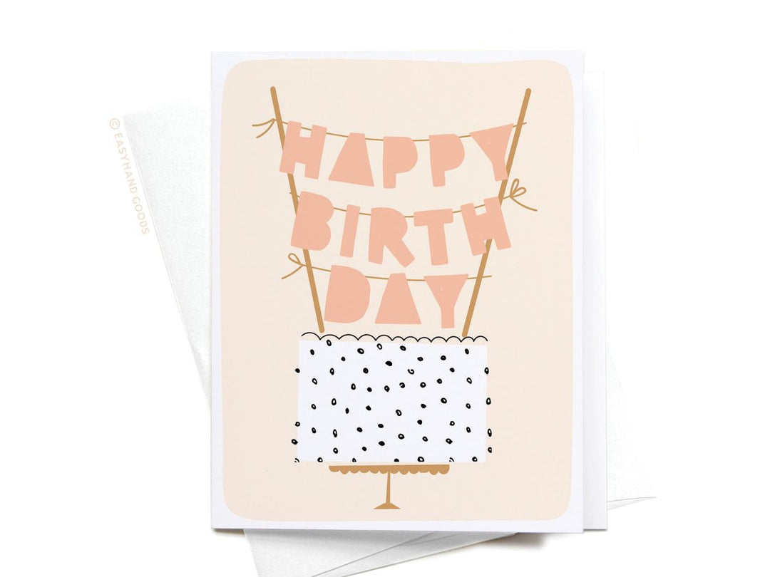 Birthday card with 'Happy Birthday' text and cake illustration on a beige background