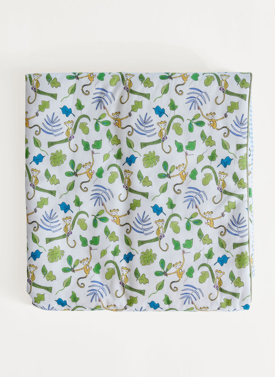 Fabric with monkey and leaf pattern on a white background