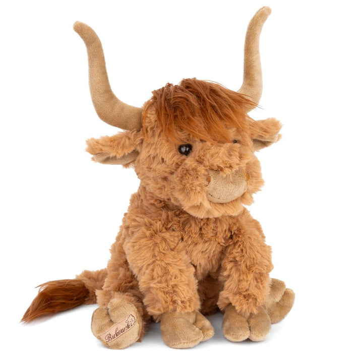 Plush toy of a brown bull with large horns on a white background