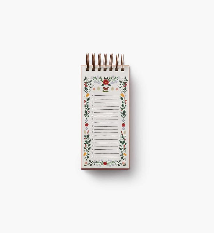 A small spiral-bound notepad with a white page, decorated with a colorful floral border and lined writing space, shown on a clean white background.