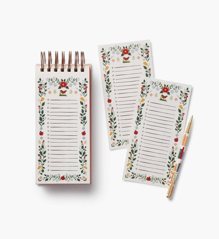 Notebook with floral design on a white background