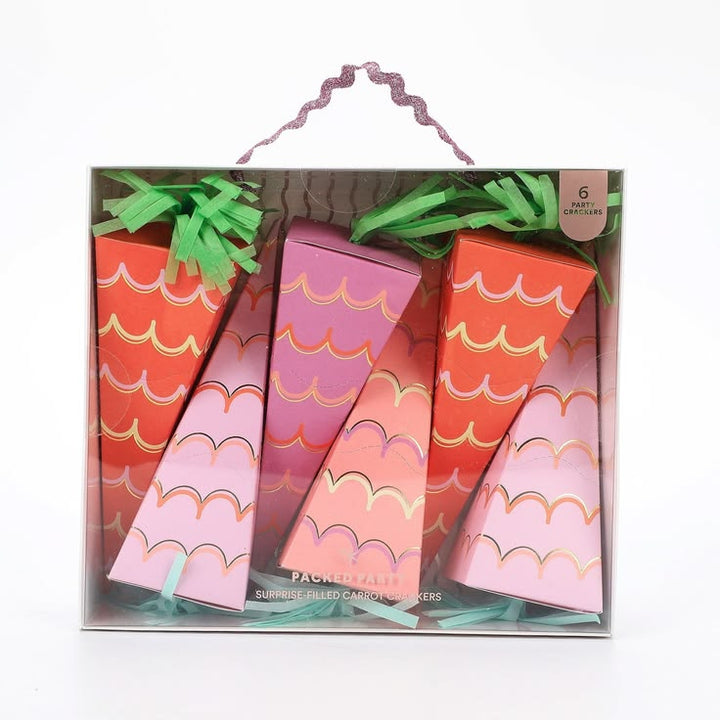Set of colorful carrot-shaped boxes with wavy patterns in a box on a white background