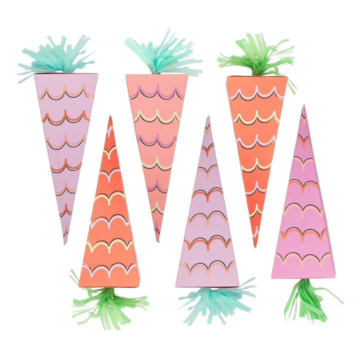 Set of colorful carrot-shaped party hats with wavy patterns on a white background