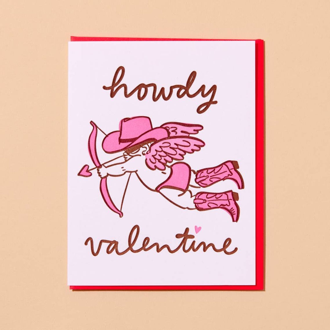 Valentine's Day card with cowboy-themed cupid illustration on a beige background