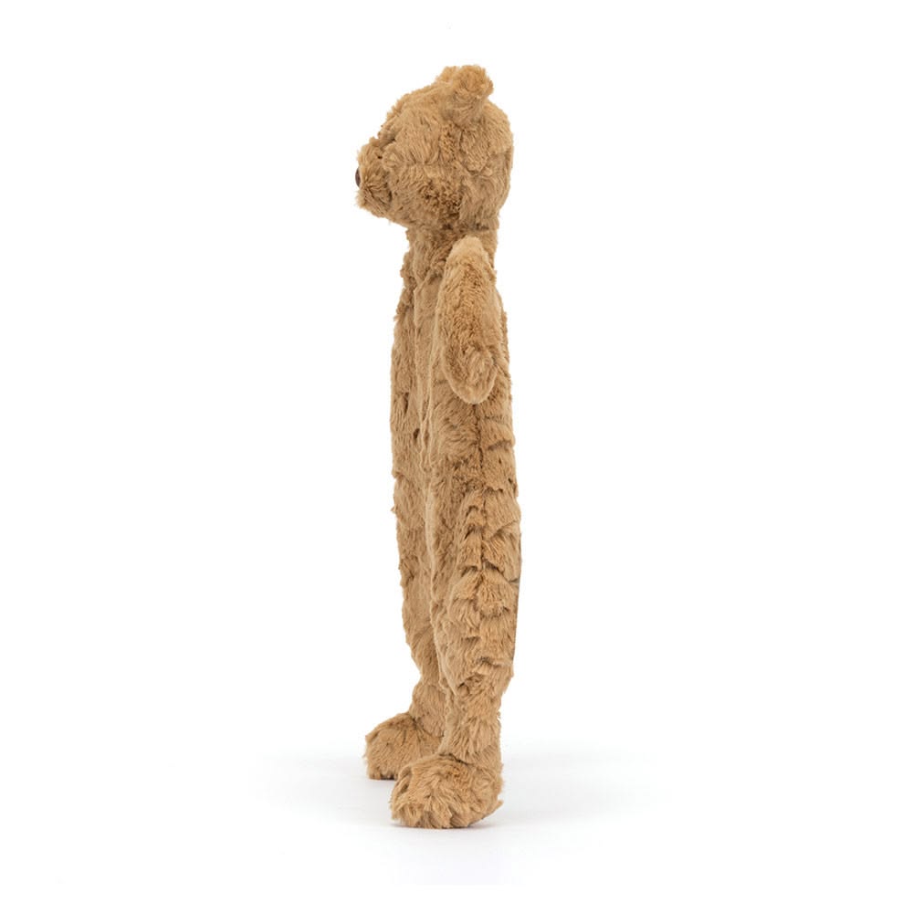 Plush toy lion standing on a white background