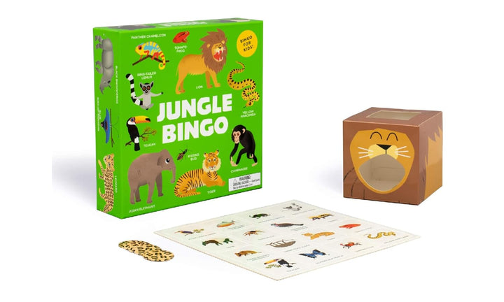 Jungle Bingo game set with a green illustrated box, a brown animal-face dice box, a white bingo card, and a few bingo tokens on a white background.
