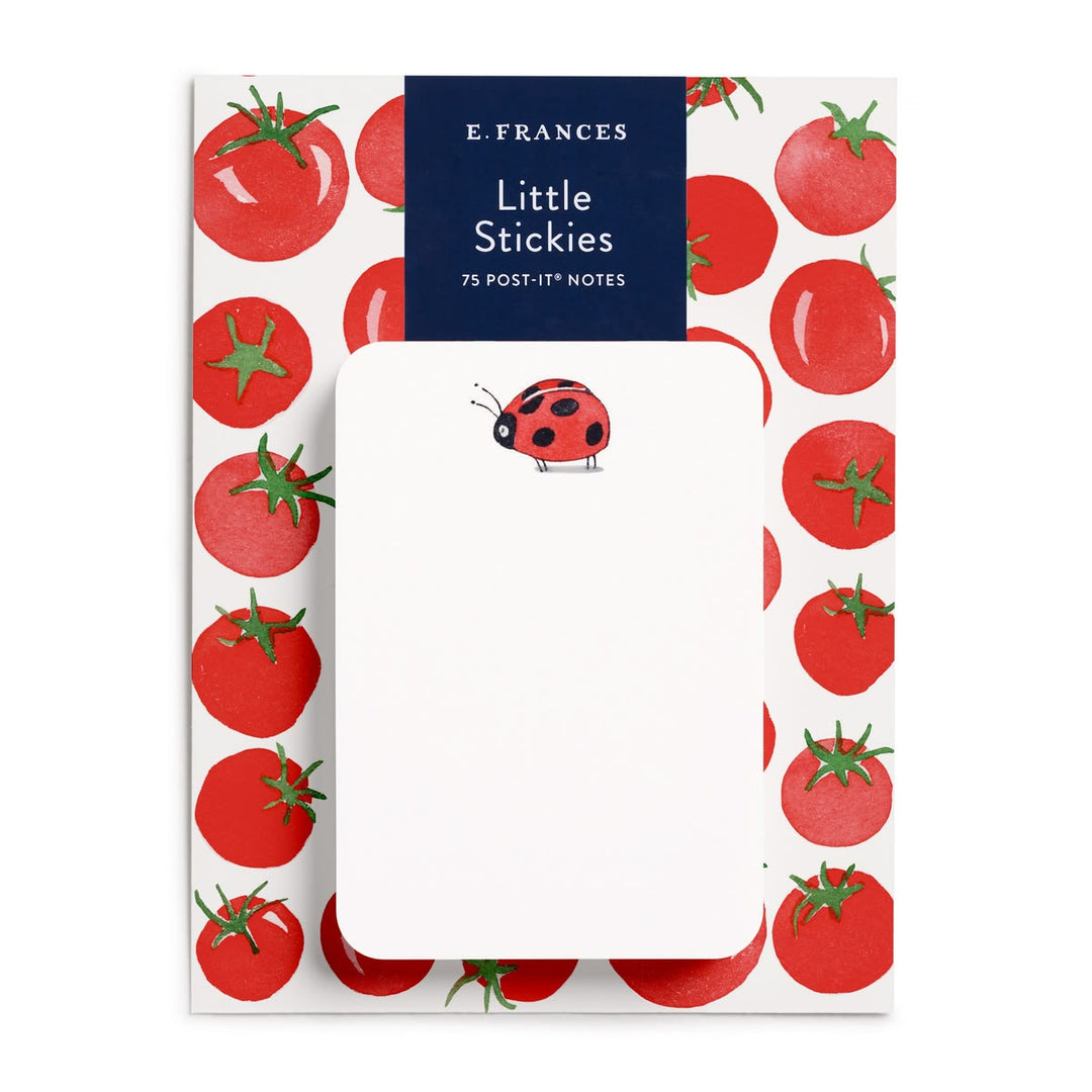 Notebook with tomato design and E. Frances branding on a white background