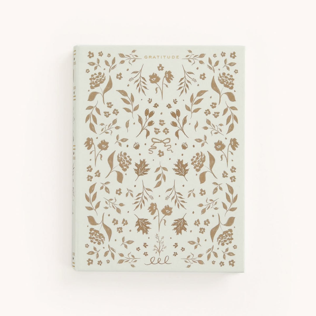 Notebook with floral pattern on a white background