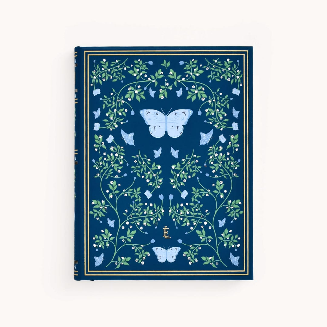 Decorative notebook with butterfly and floral design on a blue background