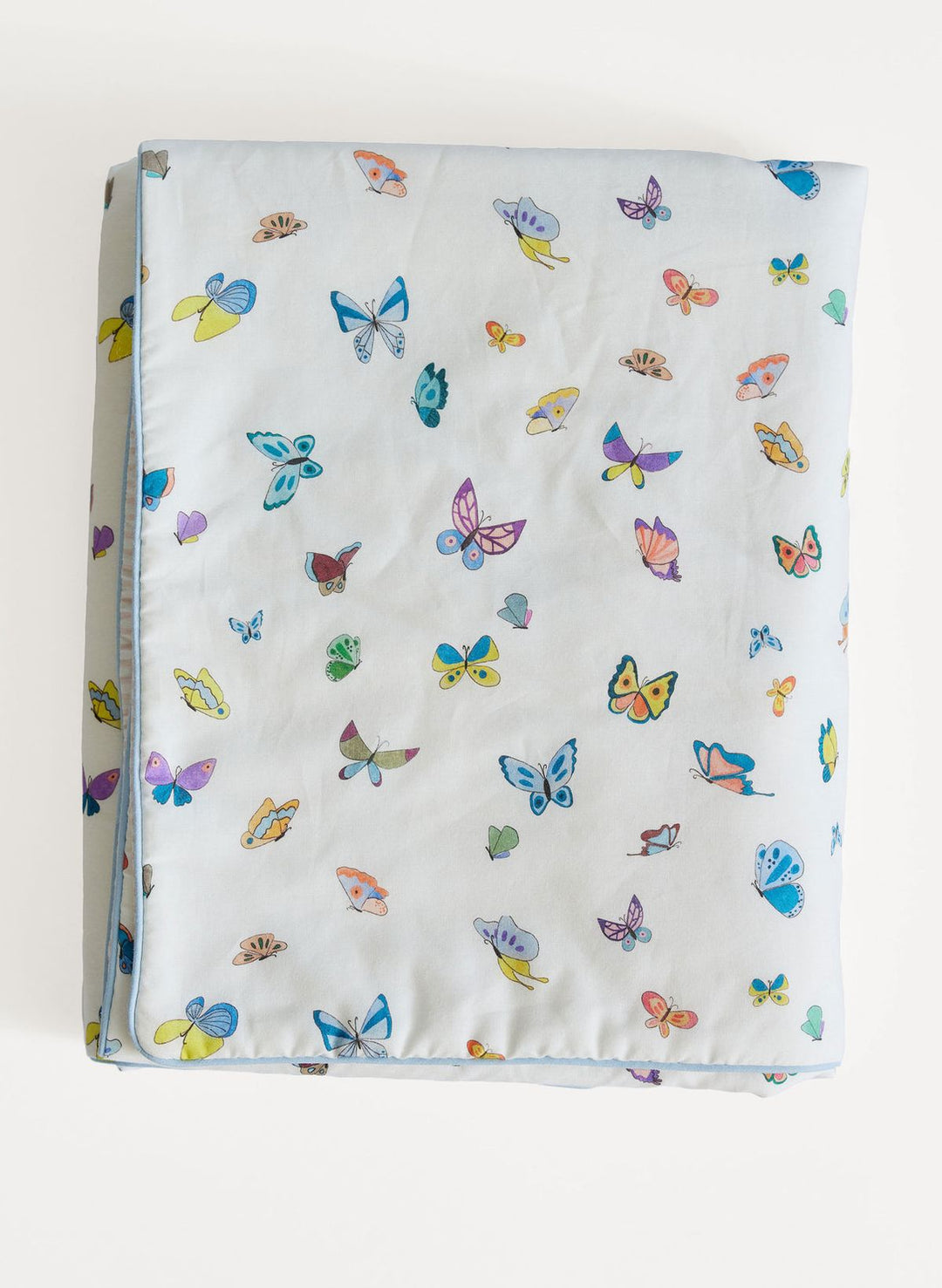 Baby blanket with colorful butterfly pattern on a white background