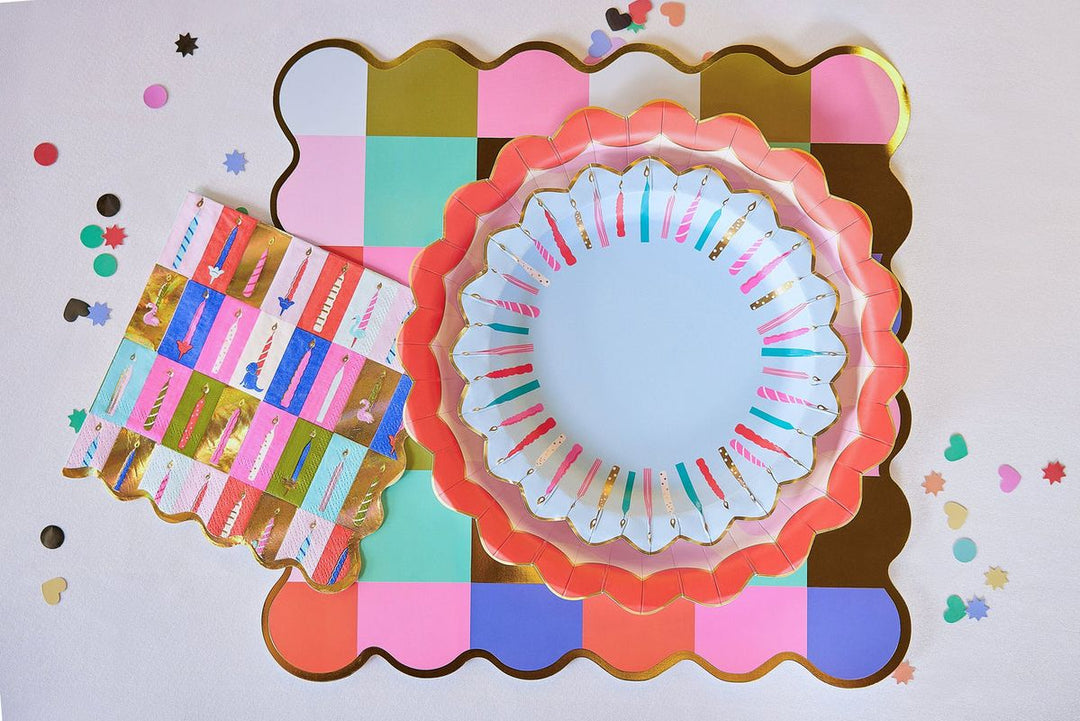 Decorative paper plates with colorful patterns on a white background