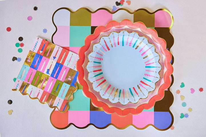 Decorative paper plates with colorful patterns on a white background