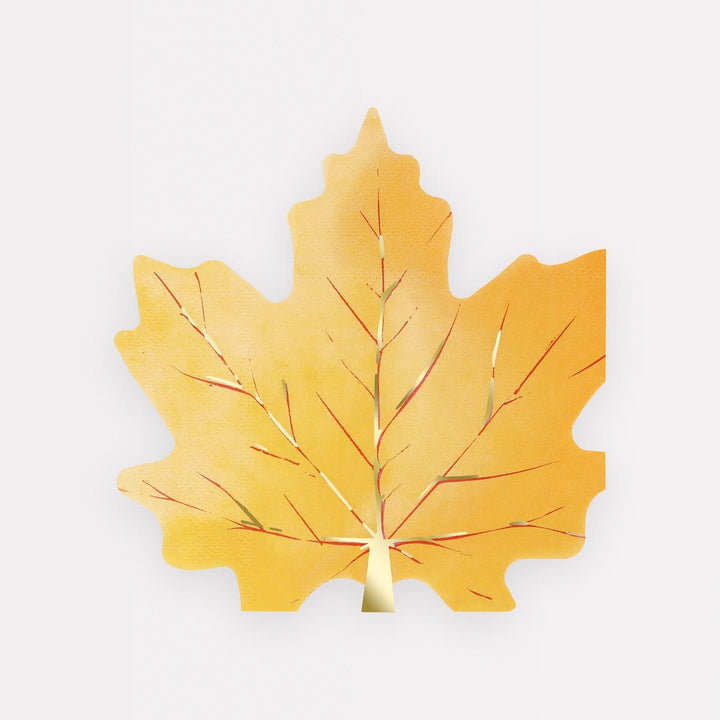 A gold maple leaf wall decor piece with metallic gold leaf texture and thin red vein details, shown against a plain white background.