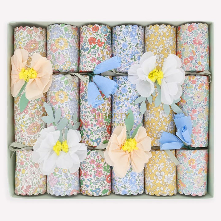 Set of floral-patterned crackers with decorative flowers on a white background