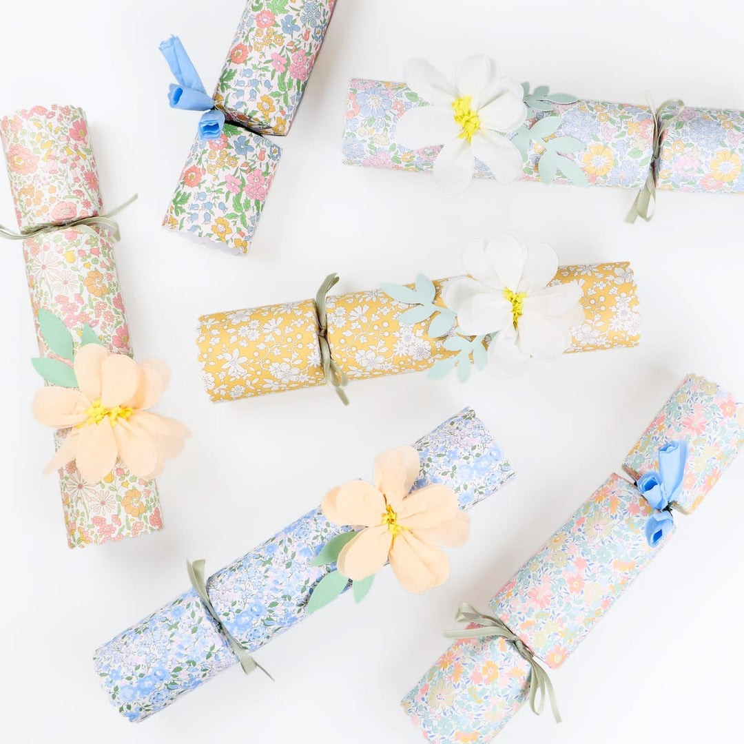 Decorative crackers with floral patterns on a white background