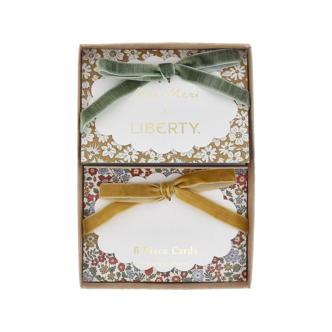 Set of Liberty London cards with decorative ribbons in a patterned box.