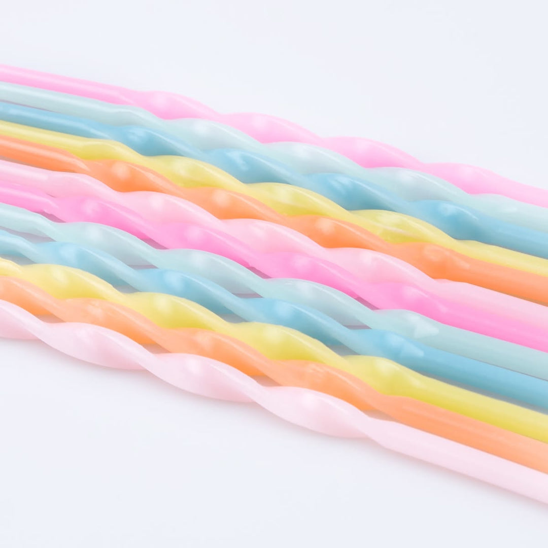 Colorful licorice sticks on a white background