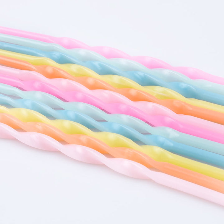 Colorful licorice sticks on a white background