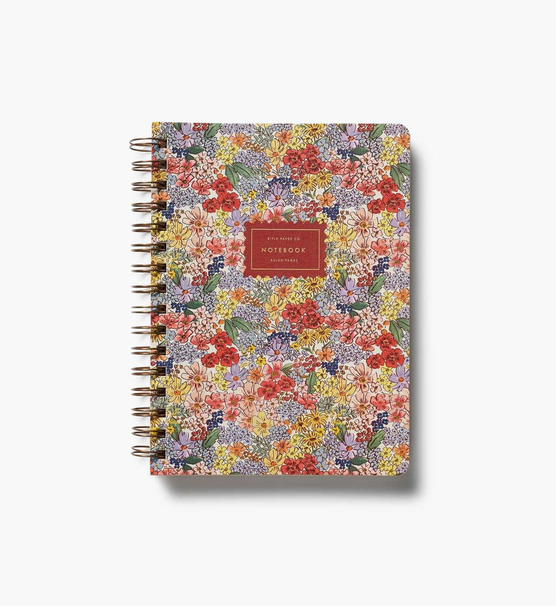 Floral patterned notebook with a red label on a white background