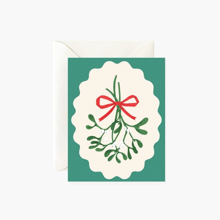 Greeting card with mistletoe design on a green background