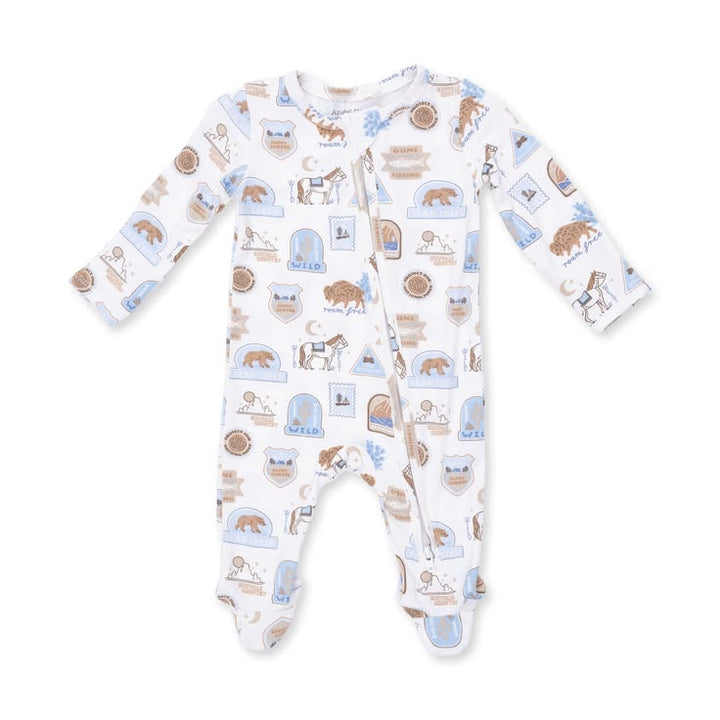 A baby long-sleeve footed sleeper in white, featuring an all-over print of horses, cows, and farm-themed illustrations in light blue and brown.