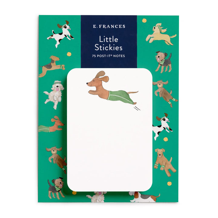 E. Frances Little Stickies stationery set featuring a green cover decorated with cartoon dogs, with a white sticky note pad in the center.
