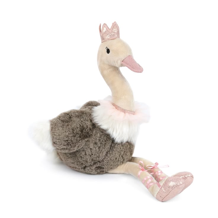 Plush toy swan with a tiara and ballet shoes on a white background