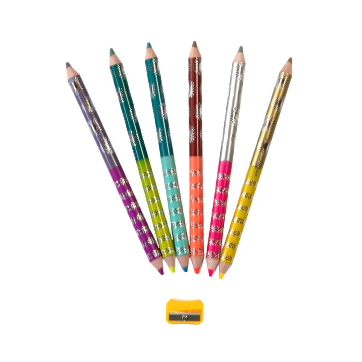 Set of colorful pencils with a sharpener on a white background