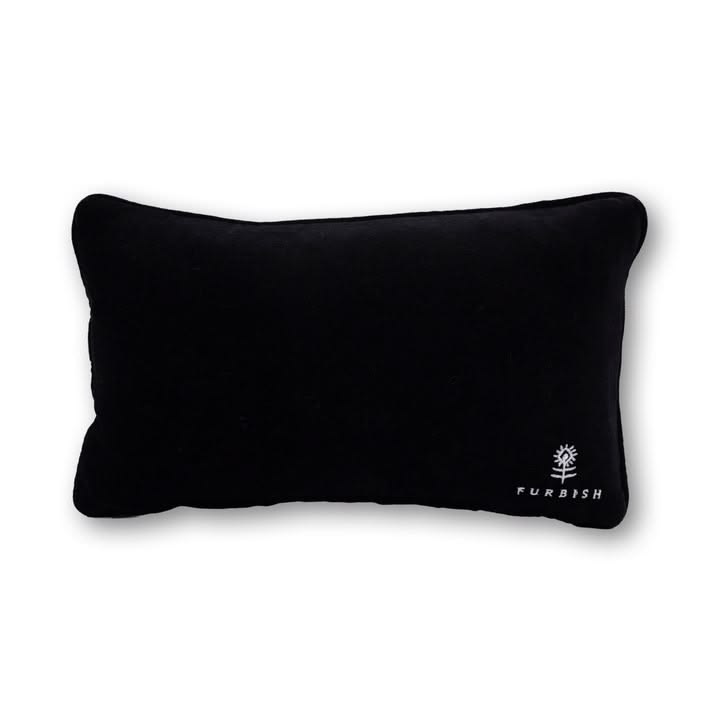 Black pillow with a brand logo on a white background