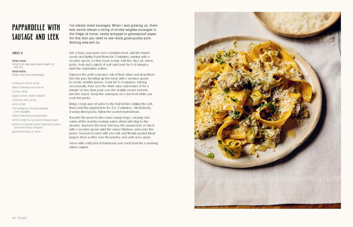 Pappardelle with Sausage and Leek on a plate with text on the left side.