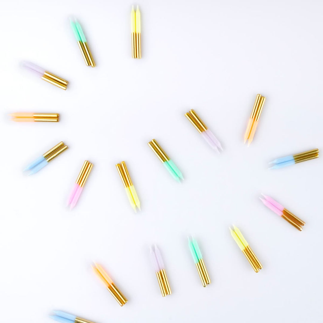 Colorful cylindrical objects on a white background