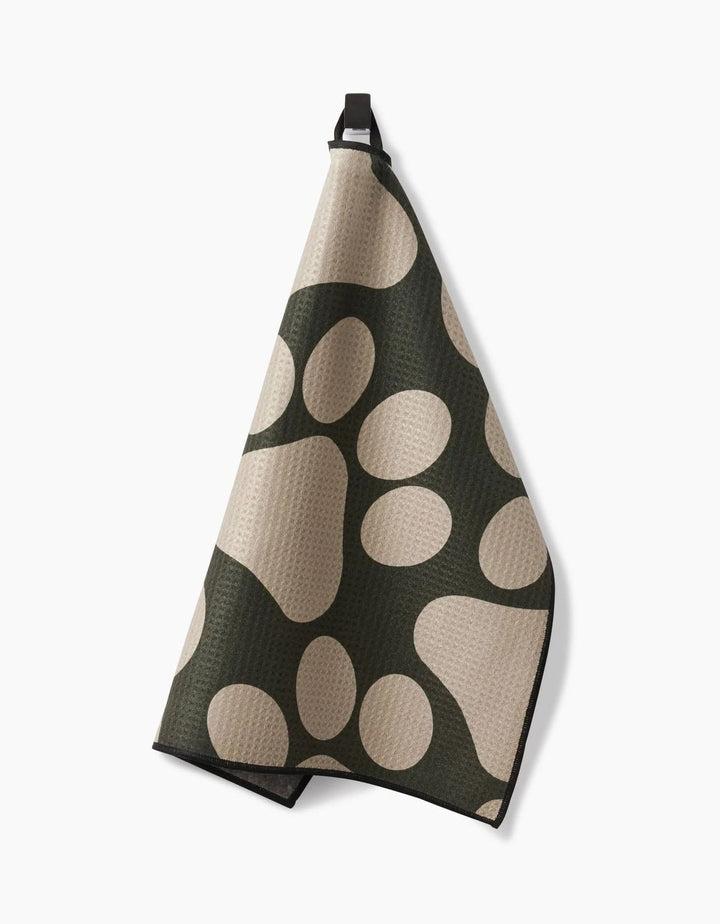 Towel with a paw print pattern on a white background