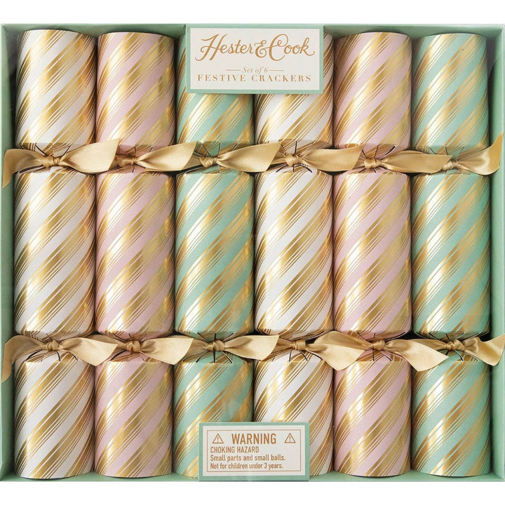 Set of Hester & Cook festive crackers with striped design in a box.