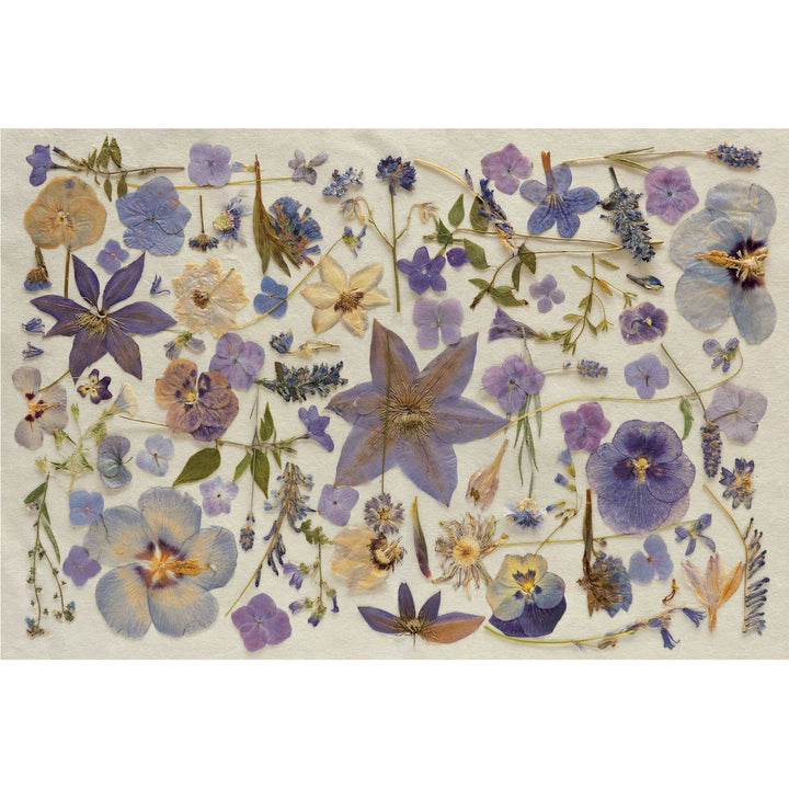 Decorative mat with pressed flowers and plants on a beige background