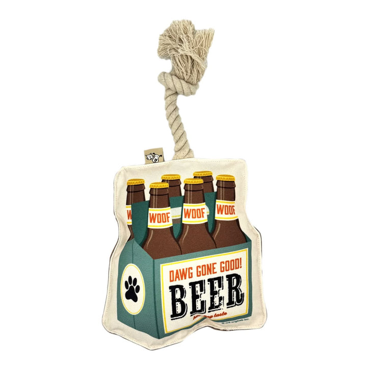 Dog toy shaped like a package of beer bottles with a rope handle on a white background