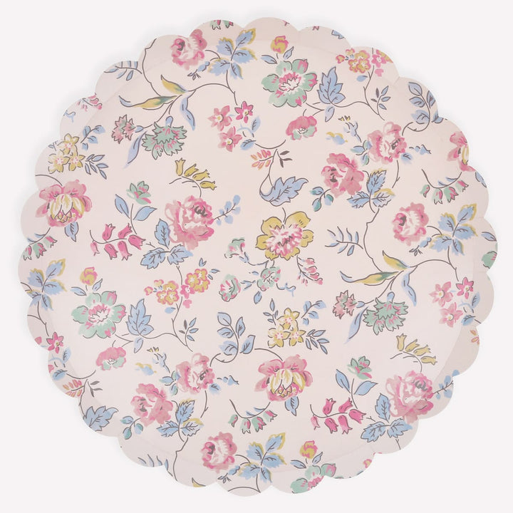 Floral patterned paper plate with pink, blue, and yellow flowers on a white background