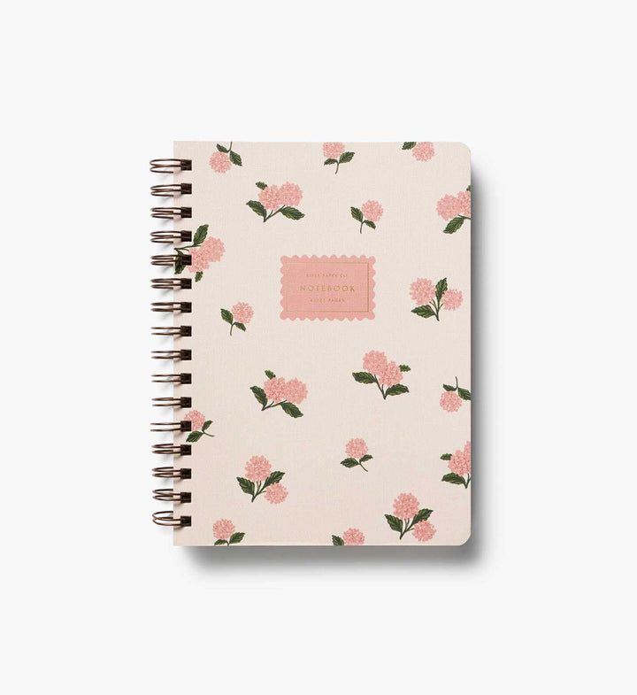 Notebook with floral pattern on a white background