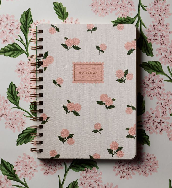 Floral notebook on a floral background