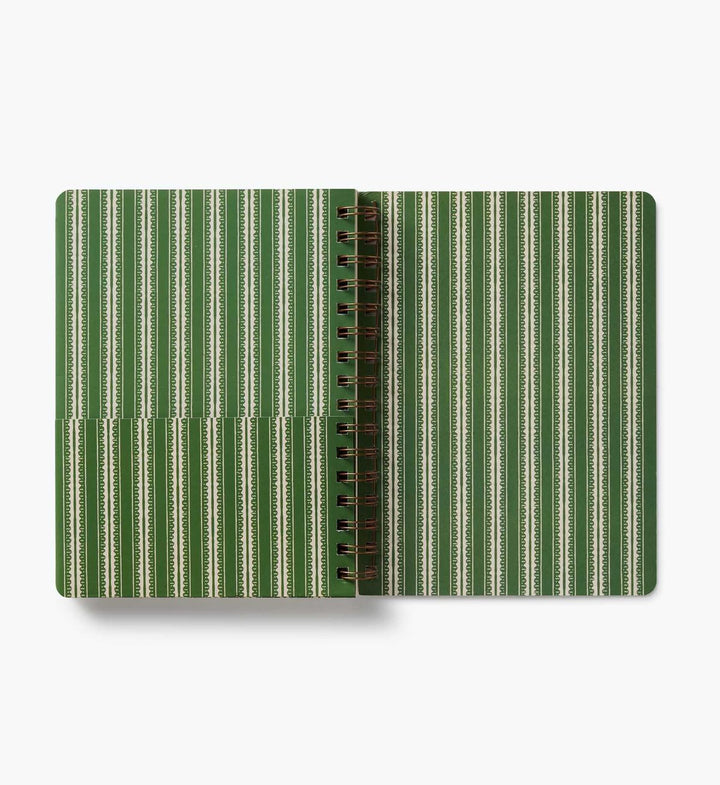 Notebook with green and beige striped cover on a white background