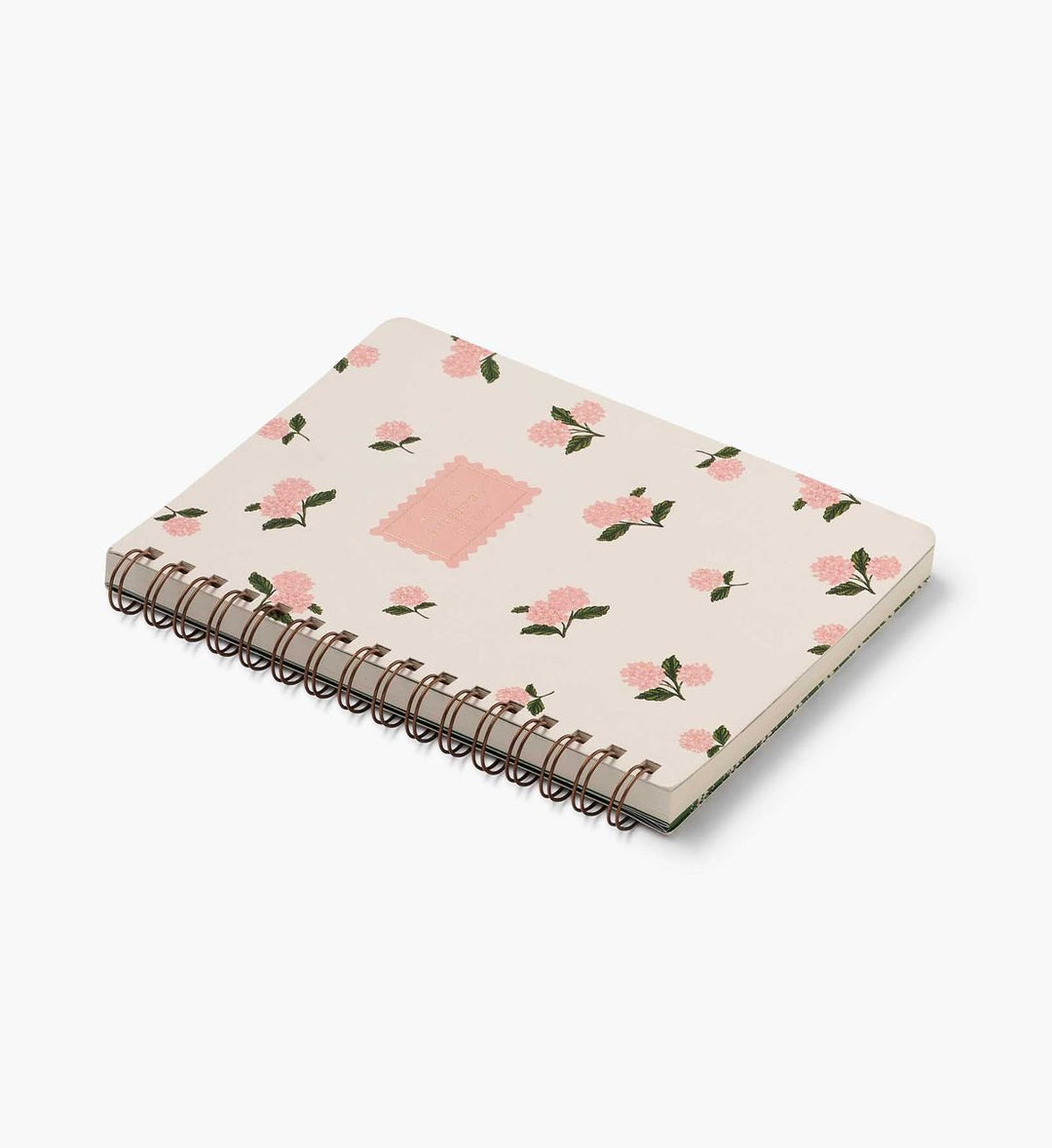Notebook with floral pattern on a white background
